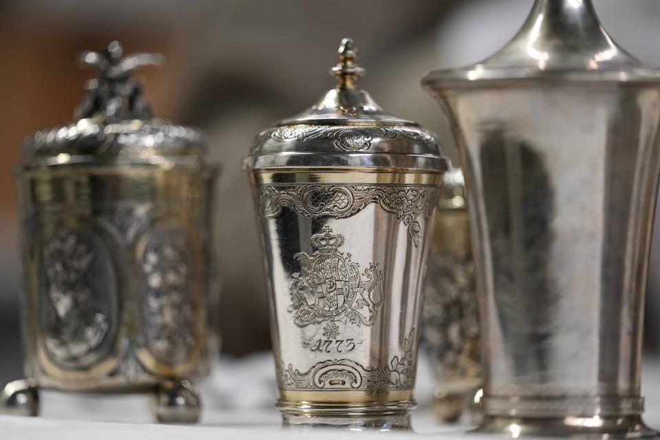 Some of the 111 silver objects stolen by the Nazis from the Jews during the Third Reich, stand at the Bavarian National Museum in Munich, Germany, Saturday, June 10, 2023. Museum staff have made it their mission to return as many of the silver objects as possible to the descendants of the original owners. (AP Photo/Matthias Schrader)