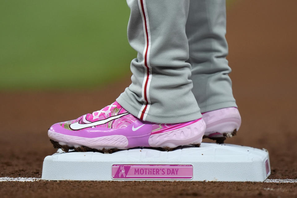 Philadelphia Phillies' Bryson Stott stands on first base after getting a single during the first inning of a baseball game against the Miami Marlins, Sunday, May 12, 2024, in Miami. (AP Photo/Wilfredo Lee)