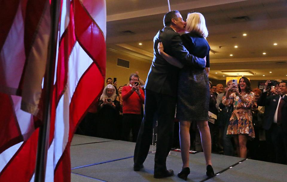 U.S. Senate candidate Bernie Moreno kisses his wife, Bridget, at the end of his speech at his watch party in Westlake on Tuesday.