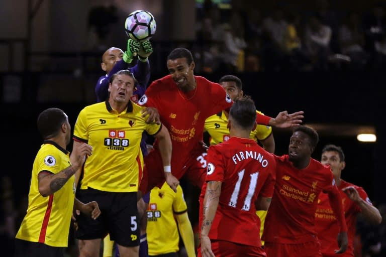 Watford's goalkeeper Heurelho Gomes punches the ball clear during the English Premier League football match between Watford and Liverpool at Vicarage Road Stadium in Watford, north of London on May 1, 2017