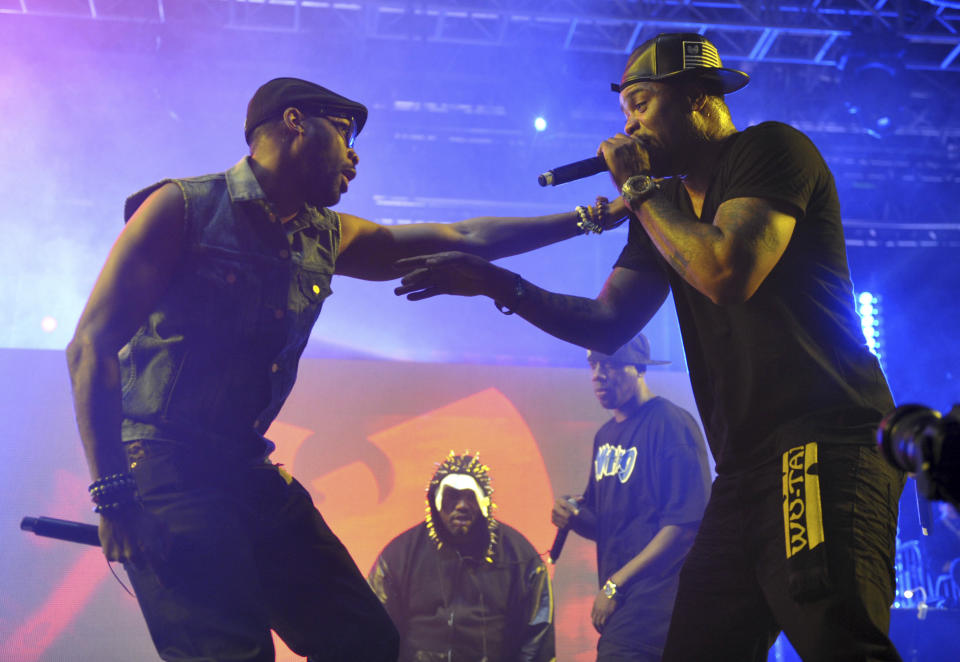 FILE - This April 21, 2013, file photo shows Robert Fitzgerald Diggs, aka RZA, left, and Clifford Smith, aka Method Man, of Wu-Tang Clan, right, performing at the second weekend of the 2013 Coachella Valley Music and Arts Festival in Indio, Calif. An unreleased Wu-Tang Clan album forfeited by Martin Shkreli after his securities fraud conviction was sold Tuesday, July 27, 2021, for an undisclosed sum, though prosecutors say it was enough to fully satisfy the rest of what he owed on a $7.4 million forfeiture order he faced after his 2018 sentencing. (Photo by John Shearer/Invision/AP, File)