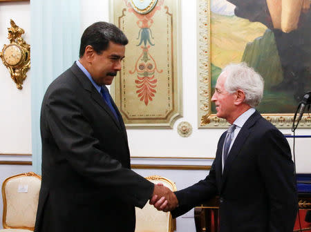 Venezuela's President Nicolas Maduro meets with U.S. Senator Bob Corker at Miraflores Palace in Caracas, Venezuela May 25, 2018. Miraflores Palace/Handout via REUTERS