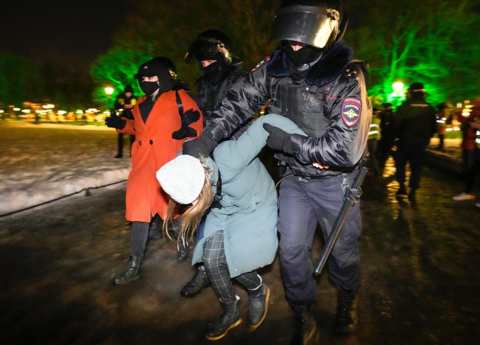 Police detain demonstrators in St. Petersburg, Russia, on Feb. 28, 2022, during a rally against Russia's attack on Ukraine.