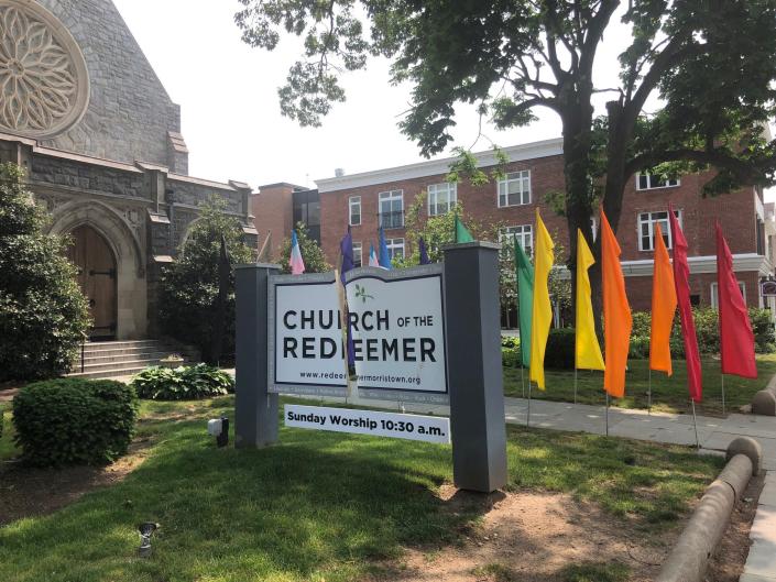 The sign in front of the Church of the Redeemer in Morristown damaged over the weekend, hours after church members put out a flag display in honor of Pride Month, is seen Monday, May 22, 2023.