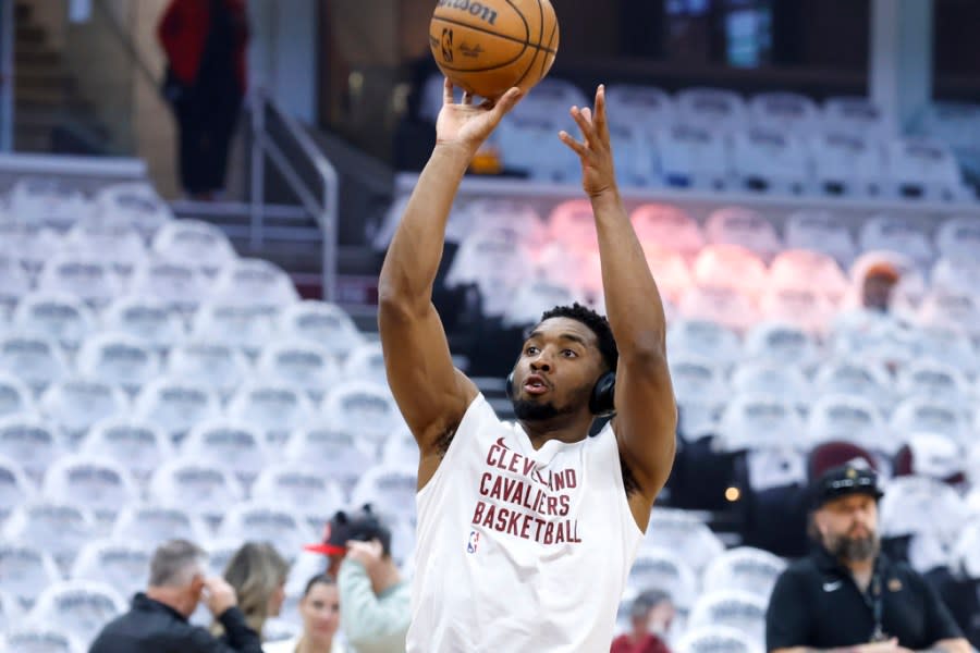 Cleveland Cavaliers guard Donovan Mitchell warms up before Game 2 of an NBA basketball first-round playoff series against the Orlando Magic, Monday, April 22, 2024, in Cleveland. (AP Photo/Ron Schwane)