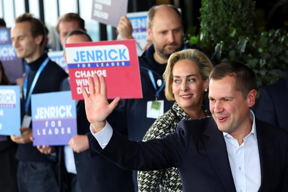 Robert Jenrick, Conservative Party MP And leadership candidate gestures as he arrives at the annual Conservative Party conference with his wife Michal Berkner in Birmingham (REUTERS)