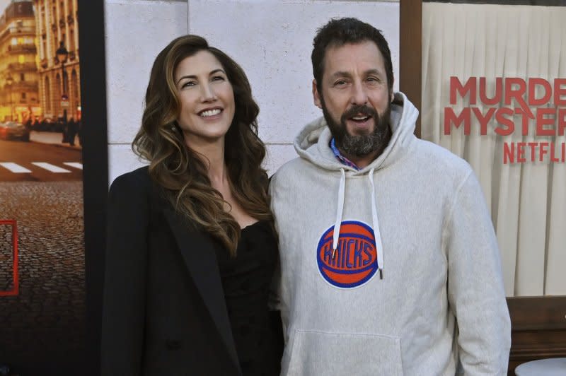 Adam Sandler (R), pictured with Jackie Sandler, stars in the new film "Spaceman." File Photo by Jim Ruymen/UPI