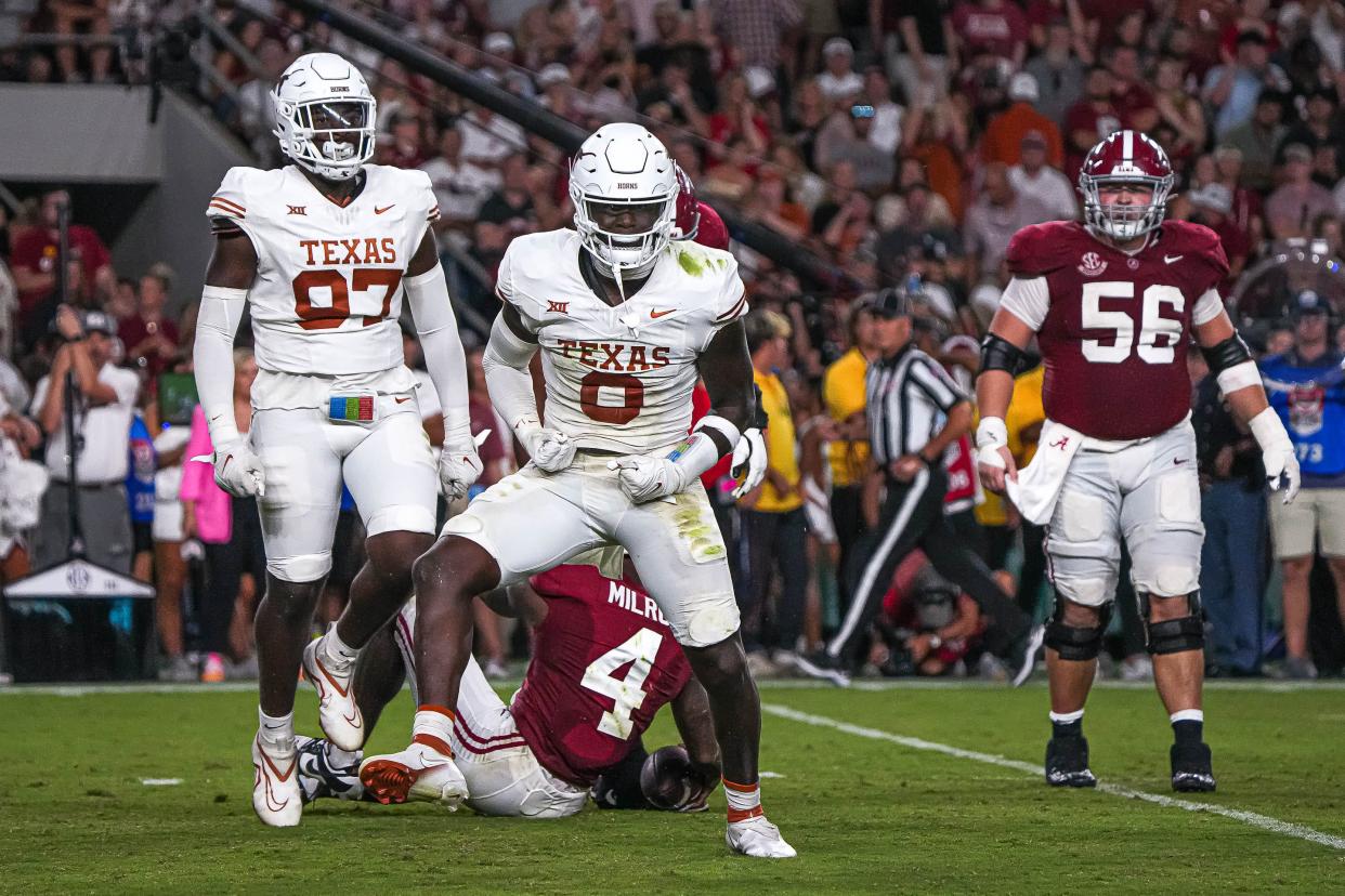 Texas linebacker Anthony Hill Jr. celebrates a sack during last year's win over Alabama. Hill has added 9 pounds and should be a key part of the Longhorns' defense next season.