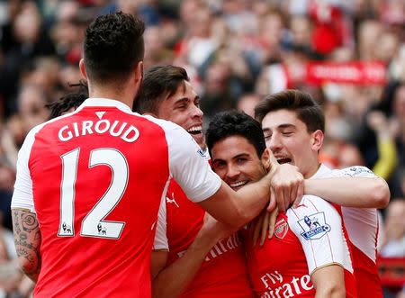 Britain Soccer Football - Arsenal v Aston Villa - Barclays Premier League - Emirates Stadium - 15/5/16 Mikel Arteta celebrates with team mates after Aston Villa's Mark Bunn scored an own goal and the fourth goal for Arsenal Reuters / Stefan Wermuth