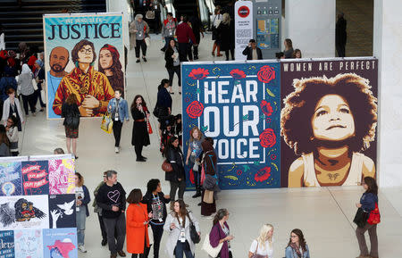 An art exhibit of social justice images is seen, during the three-day Women's Convention at Cobo Center in Detroit, Michigan, U.S., October 28, 2017. REUTERS/Rebecca Cook