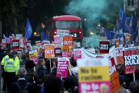 Anti-Brexit protesters attend a demonstration outside the Houses of Parliament, in London