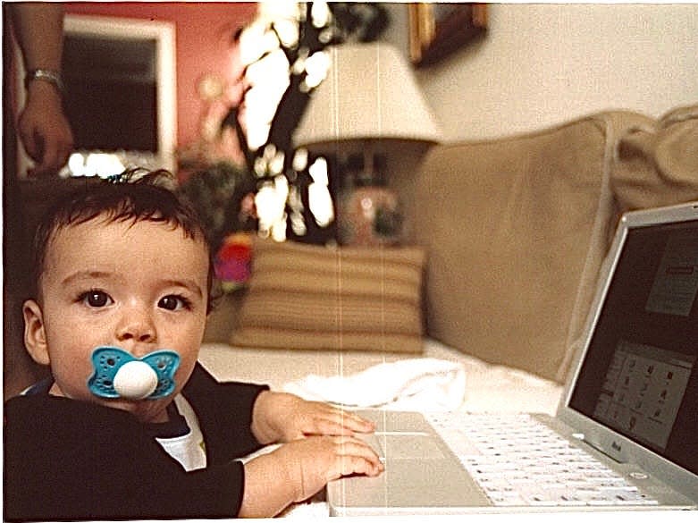 Baby Diego Palma on his dad's computer.