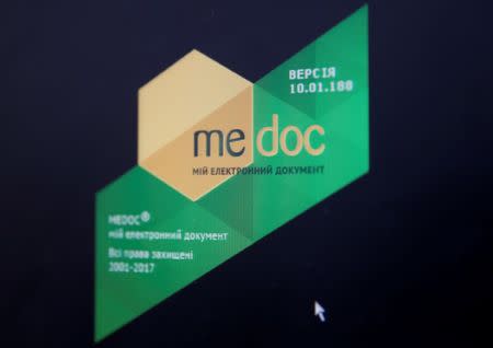 FILE PHOTO: The logo of the M.E.Doc accounting software is seen on a computer screen at an office in Kiev, Ukraine July 5, 2017. REUTERS/Valentyn Ogirenko/File Photo