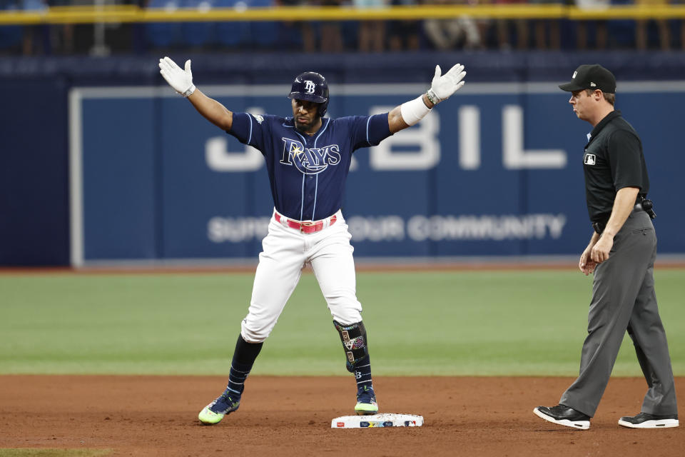 Tampa Bay Rays’ Yandy Diaz celebrates after hitting an RBI double against the Seattle Mariners during the seventh inning of a baseball game Saturday, Sept. 9, 2023, in St. Petersburg, Fla. (AP Photo/Scott Audette)