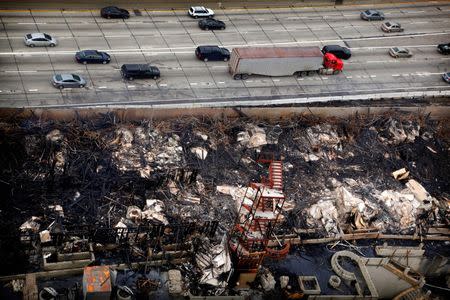 An overview shows the aftermath of the 1.3 million-square-foot Da Vinci residential complex that was destroyed by fire in Los Angeles, California December 10, 2014. REUTERS/Barbara Davidson/Pool