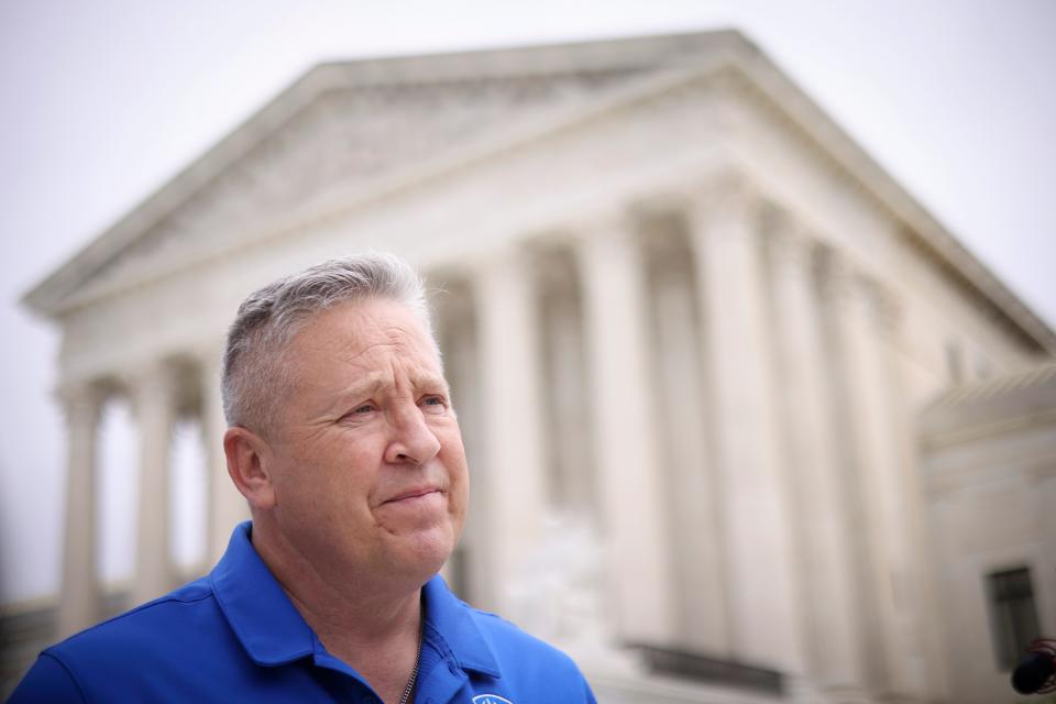 Former Bremerton High School assistant football coach Joe Kennedy answers questions after his legal case, Kennedy vs. Bremerton School District, was argued before the Supreme Court on April 25,