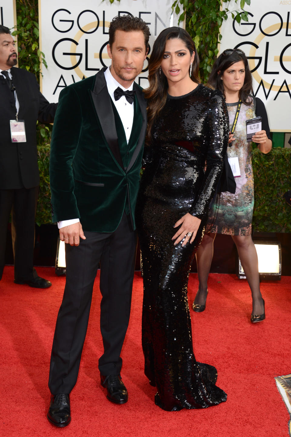 Matthew McConaughey and Camila Alves/Grade B-: The "Dallas Buyers Club" actor dared to be really different in a green velvet Dolce & Gabbana three-piece tuxedo, while his lovely wife shimmered in a form-fitting black gown.Photo by Jordan Strauss/Invision/AP)