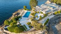 <p>No. 6: <span>5365 Seaside Place, West Vancouver, B.C.</span><br> List price: $29,980,000<br> Get away from it all in your own personal gated paradise. Sitting on a private peninsula with 650 feet of natural shoreline, this four bedroom, seven bathroom home offers a clean and contemporary style with high ceilings and an open, bright feel throughout. (Photo: Malcolm Hasman) </p>