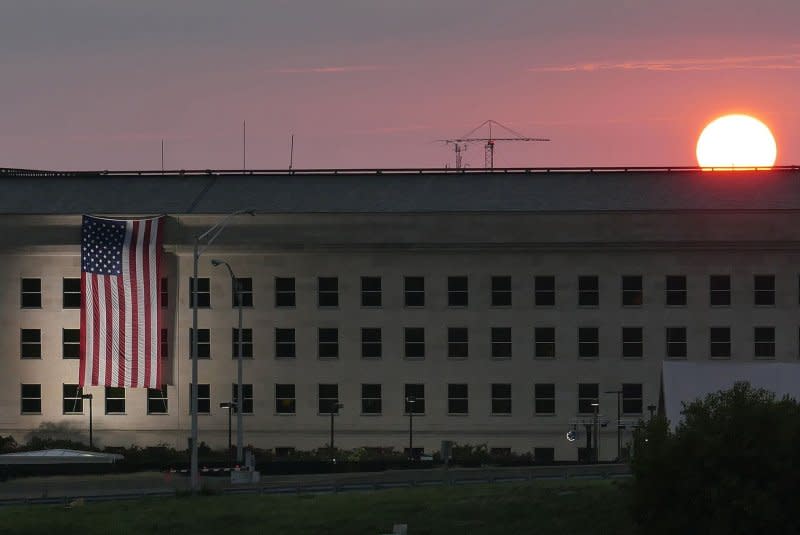 The sun rises at the Pentagon on September 11, 2016, prior to a ceremony to commemorate the 15th anniversary of the September 11, 2001 terror attacks. On January 15 1943, the Pentagon, the world's largest building of its kind, was dedicated on the Virginia side of the Potomac River just outside of Washington. File Photo by Damon J. Moritz/UPI