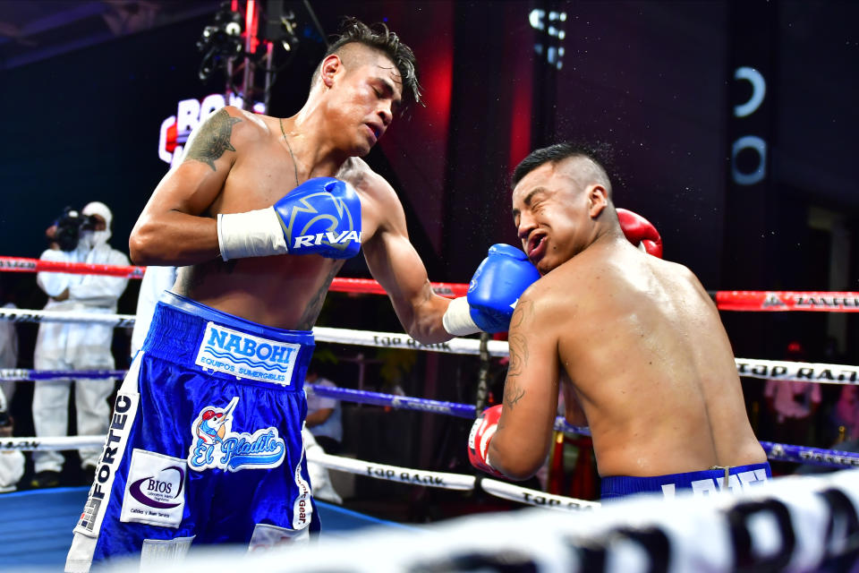 MEXICO CITY, MEXICO - JUNE 20: Emanuel Navarrete fights against Uriel Lopez during an unofficial fight At TV Azteca on June 20, 2020 in Mexico City, Mexico. The event is organized and broadcasted by TV Azteca as part of a TV Show. Sporting events are not permitted in Mexico as a preventive measure to halt the spread of COVID-19. (Photo by Jaime Lopez for Zanfer/Jam Media/Getty Images)