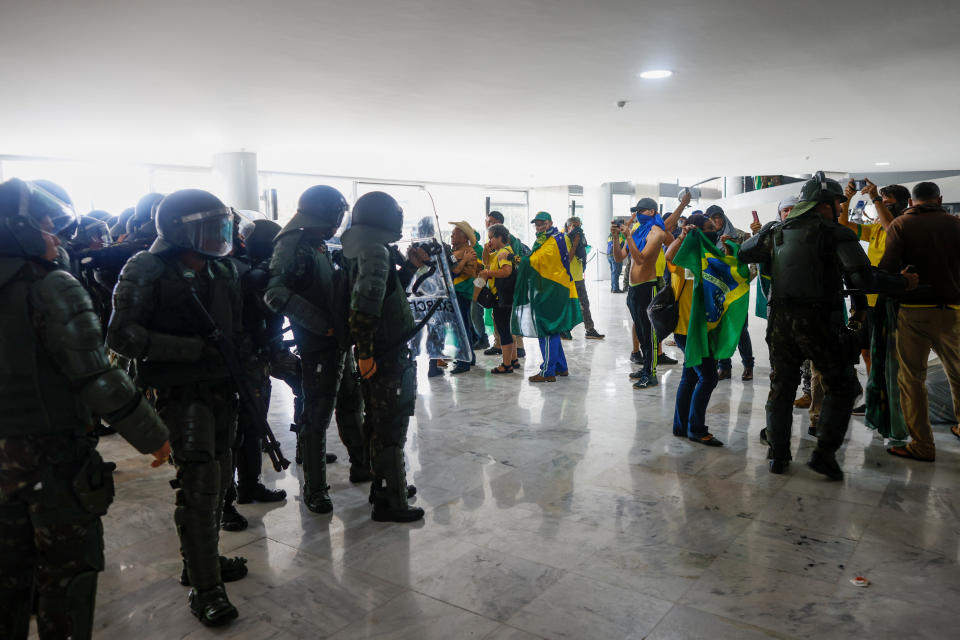 Security forces operate as supporters of Brazil's former President Jair Bolsonaro demonstrate against President Luiz Inacio Lula da Silva, in Planalto Palace, in Brasilia, Brazil, January 8, 2023. REUTERS/Adriano Machado