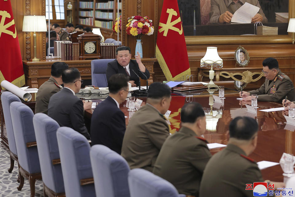 In this undated photo provided by the North Korean government, North Korean leader Kim Jong Un, center, attends a meeting of the North Korean ruling Workers’ Party’s central military commission in Pyongyang, North Korea Wednesday, Aug. 9, 2023. Independent journalists were not given access to cover the event depicted in this image distributed by the North Korean government. The content of this image is as provided and cannot be independently verified. Korean language watermark on image as provided by source reads: "KCNA" which is the abbreviation for Korean Central News Agency. (Korean Central News Agency/Korea News Service via AP)