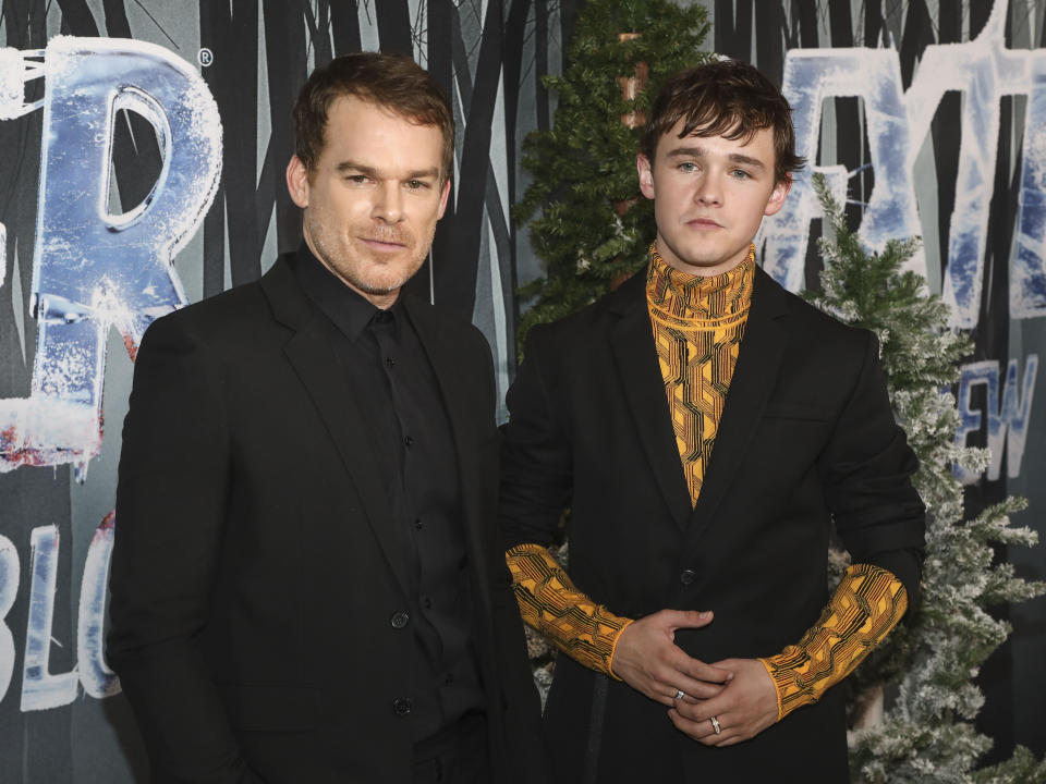 Actors Michael C. Hall, left, and Jack Alcott, right, attend the world premiere of the Showtime drama series "Dexter: New Blood" at Alice Tully Hall on Monday, Nov. 1, 2021, in New York. (Photo by Andy Kropa/Invision/AP)