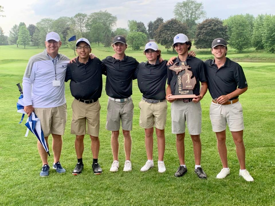 Detroit Catholic Central celebrates winning the Division 1 boys golf regional on Wednesday, June 1, 2022, at Salem Hills. Pictured are (l-r) coach Mike Anderson, Neil Zhu, Matthew Mans, Julian Menser, Peter Stassinopoulos and Liam Casey