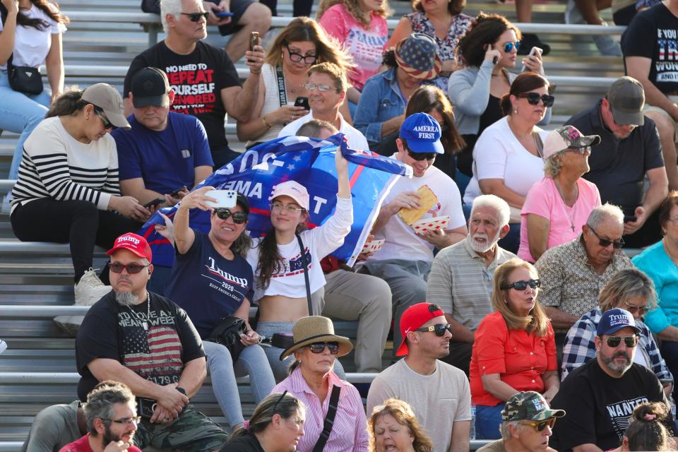 Trump supporters arrive before former President Donald Trump is scheduled to speak at Ted Hendricks Stadium at Henry Milander Park in Hialeah, Florida, Wednesday, November 8, 2023.