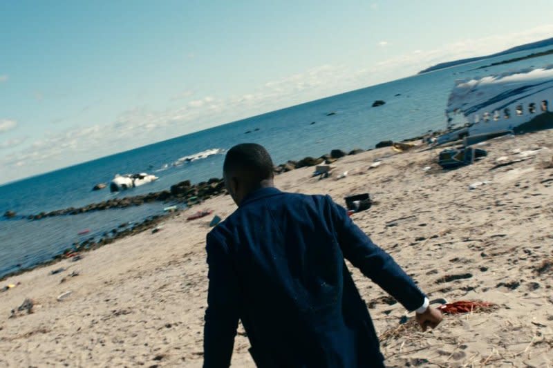 G.H. (Mahershala Ali) witnesses some of the disaster. Photo courtesy of Netflix