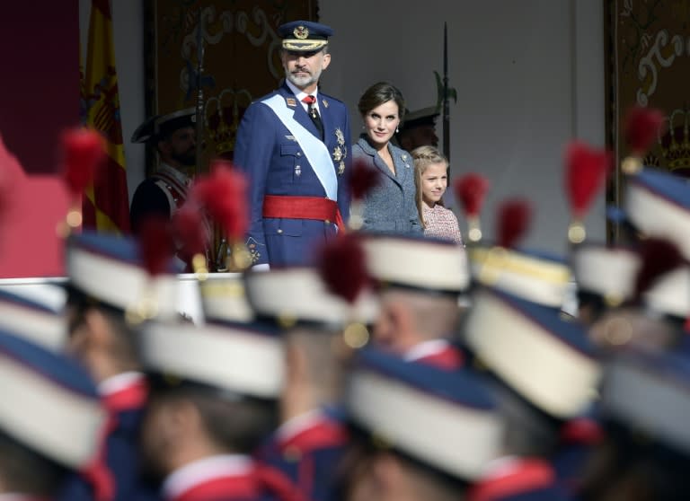 King Felipe VI presided over the annual military parade marking Spain's National Day in Madrid, under the cloud of the Catalan government's threat to declare independence