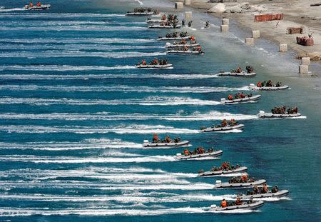 Turkish marines sail for a landing exercise during the EFES-2009 military exercise in Izmir, Turkey, May 26, 2009. REUTERS/Umit Bektas/File photo