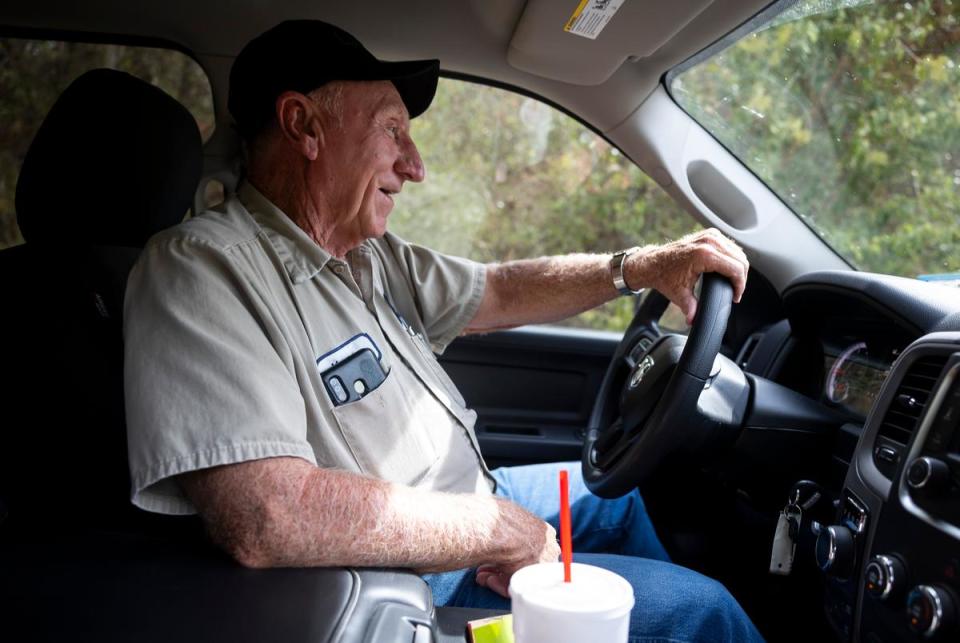 Marvin Stovall, a road foreman for Liberty County Precinct 2, drives through the Sam Houston Lakes Estates neighborhood on August 22, 2023. Stovall used to attend weekend dances at the community center at the entrance of the neighborhood over 50 years ago.