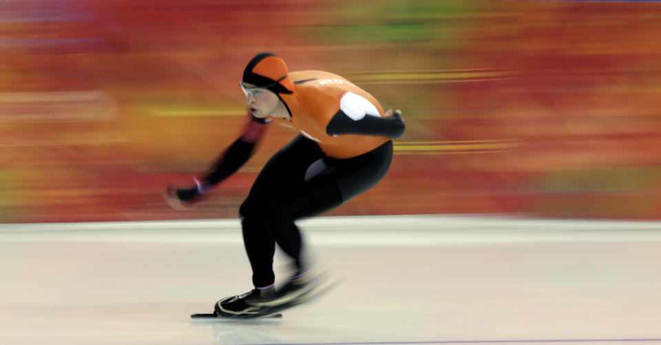 Sven Kramer, of the Netherlands, competes in the men's 5,000-meter speed skating race at the Adler Arena Skating Center during the 2014 Winter Olympics in Sochi, Russia, Saturday, Feb. 8, 2014. Kramer set a new Olympic record.