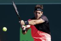 Mar 25, 2018; Key Biscayne, FL, USA; Juan Martin del Potro of Argentina hits a backhand against Kei Nishikori of Japan (not pictured) on day six of the Miami Open at Tennis Center at Crandon Park. Del Potro won 6-2, 6-2. Geoff Burke-USA TODAY Sports