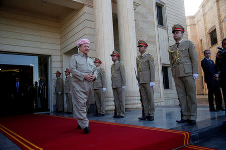 FILE PHOTO: Iraq's Kurdistan region's President Massoud Barzani waits to receive French Foreign Minister Jean-Yves le Drian and the French Defence Minister Florence Parly in Erbil, Iraq, August 26, 2017. REUTERS/Azad Lashkari