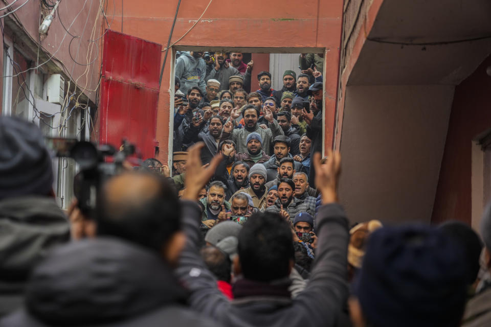 Supporters of Jammu Kashmir National Conference shout slogans during a protest in Srinagar, Indian controlled Kashmir,Tuesday, Dec 23, 2023. Anger spread in some remote parts of Indian-controlled Kashmir after three civilians were killed while in army custody, officials and residents said Saturday. This comes two days after a militant ambush killed four soldiers. (AP Photo/Mukhtar Khan)