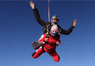 A thrill seeking great-gran has celebrated her 90th birthday - by taking to the air and SKYDIVING from 15,000 feet. Sprightly Patricia Baker said it felt "awesome" to plunge from a whopping three miles up in testing conditions. Brilliant photos and videos show the widowed gran-of-ten dressed in a red jumpsuit flying through the sky. Patricia said she "wasn't too worried" about the jump because she "keeps herself fit" by doing 50 sit ups every morning. And her main motivation was to raise some money for charity, she added.