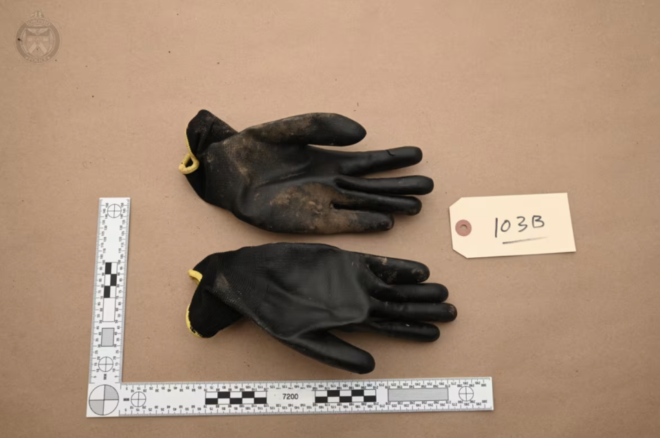 Toronto police said they found a backpack near the door, which contained a hunting knife with red stains along with a pair of black work gloves. (Court Exhibit)