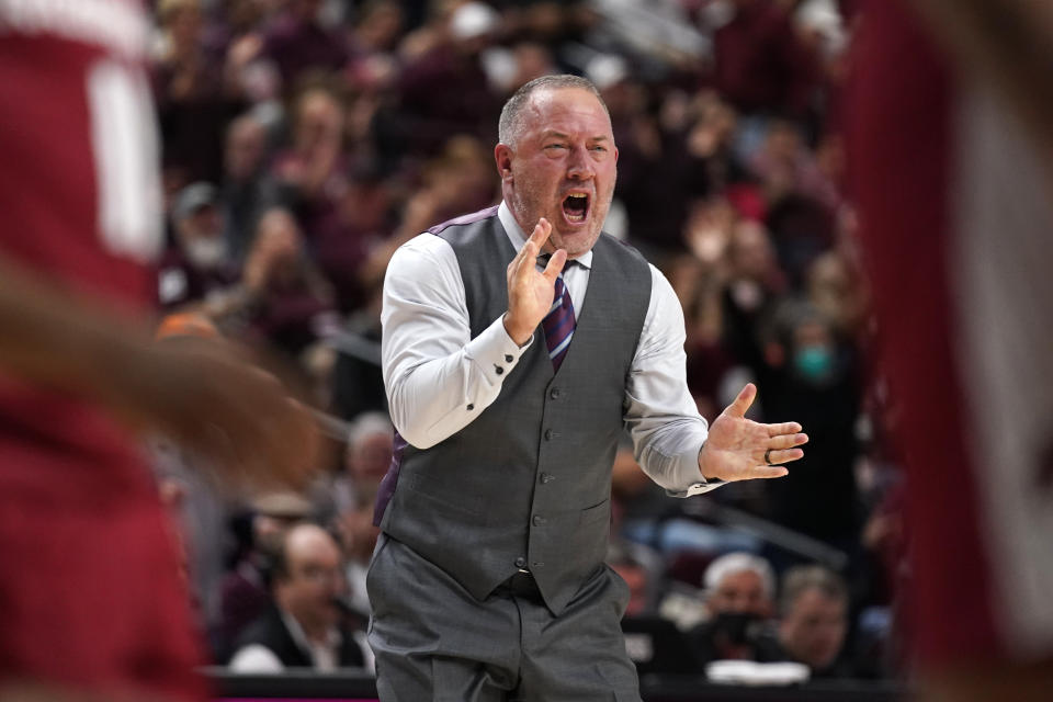 Texas A&M head coach Buzz Williams reacts after his team made a 3-point basket against Arkansas during the second half of an NCAA college basketball game Saturday, Jan. 8, 2022, in College Station, Texas. (AP Photo/Sam Craft)