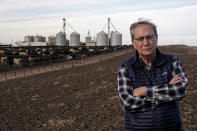 Lee Reeve poses for a photo at the cattle feedyard and ethanol plant operated by his family Thursday, Jan. 5, 2023, near Garden City, Kan. Reeve sees language by the Kansas Water Authority on controlling groundwater use in western Kansas as "toxic,"as the Kansas Legislature looks to take up ways to address depletion of the Ogallala Aquifer in the upcoming session. (AP Photo/Charlie Riedel)
