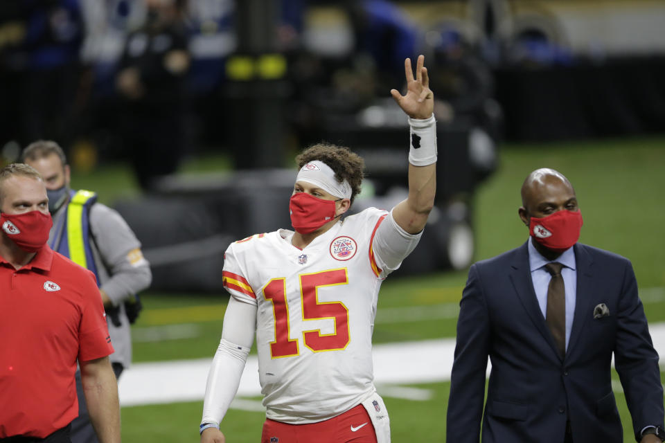 Kansas City Chiefs quarterback Patrick Mahomes (15) waves as he walks off the field after an NFL football game against the New Orleans Saints in New Orleans, Sunday, Dec. 20, 2020. The Chiefs won 32-29. (AP Photo/Brett Duke)