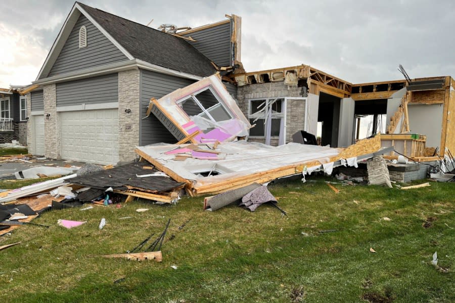 A destroyed home is seen northwest of Omaha, Neb., after a storm tore through the area on Friday, April 26, 2024. (AP Photo/Margery A. Beck)