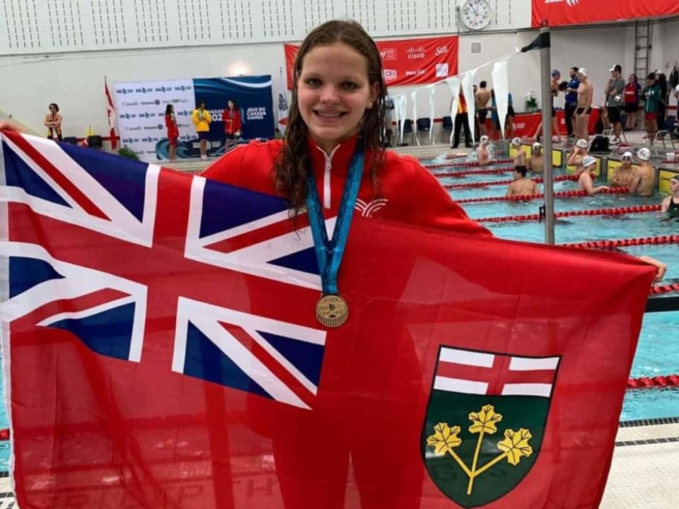 Julie Brousseau won this gold medal on Aug. 10, 2022, in the 200-metre freestyle swimming competition at the Canada Games in St. Catharines, Ont. The Ottawa teen snagged 11 medals, tying the record for most medals won at a single Canada Games. (Team Ontario/Twitter - image credit)