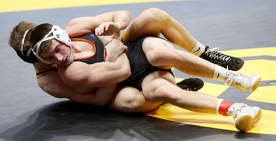 Ashland's Jon Metzger wrestles Medina's Andrew Supers during their 157 lbs. match at the OHSAA State Wrestling Championships Friday, March 10, 2023 at the Jerome Schottenstein Center. TOM E. PUSKAR/ASHLAND TIMES-GAZETTE