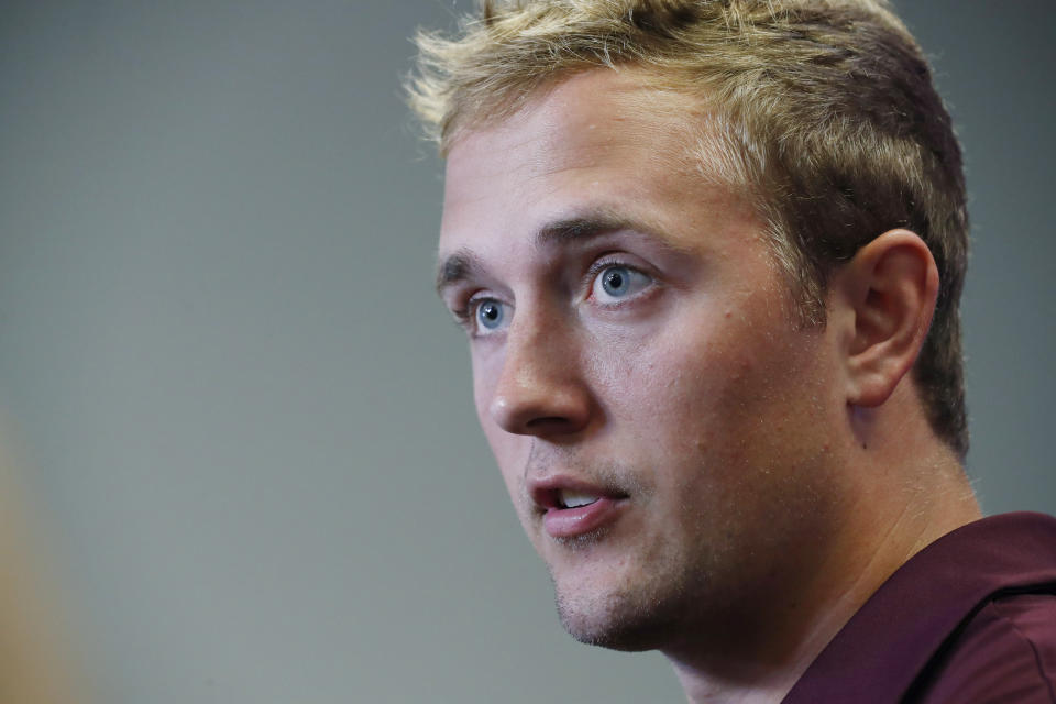 In this Aug. 10, 2019, file photograph, Mississippi State quarterback Tommy Stevens answers a reporter's question about competition among quarterbacks in preseason camp as they prepare for the upcoming NCAA college football season during media day, in Starkville, Miss. (AP Photo/Rogelio V. Solis, File)