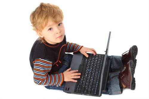 Young child with laptop