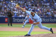 Toronto Blue Jays relief pitcher Anthony Bass throws to a Cleveland Guardians batter during the seventh inning of a baseball game in Toronto on Saturday, Aug. 13, 2022. (Jon Blacker/The Canadian Press via AP)