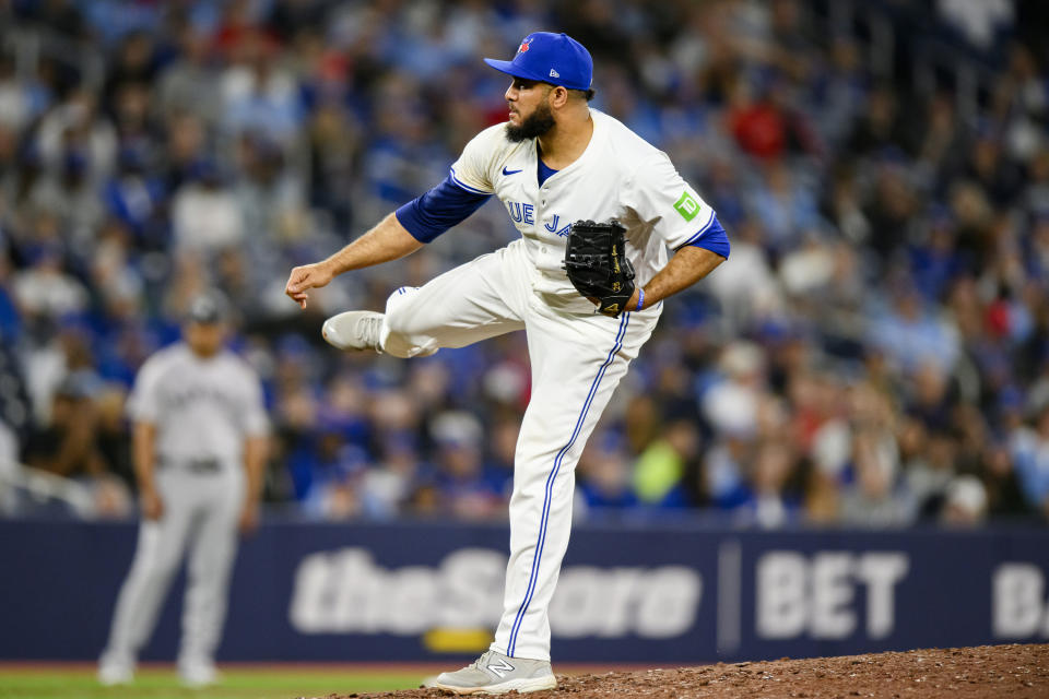 Toronto Blue Jays pitcher Yimi García throws the ball during ninth inning of a baseball game against the New York Yankees in Toronto on Monday, April 15, 2024. (Christopher Katsarov/The Canadian Press via AP)