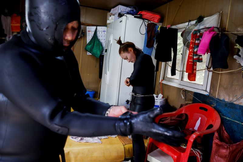 The Wider Image: For South Korea's youngest 'sea women', warming seas mean smaller catches